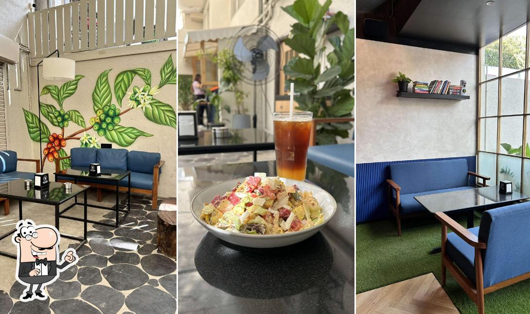 Take a seat at one of the tables at Coffee Nation - Kalyani Nagar