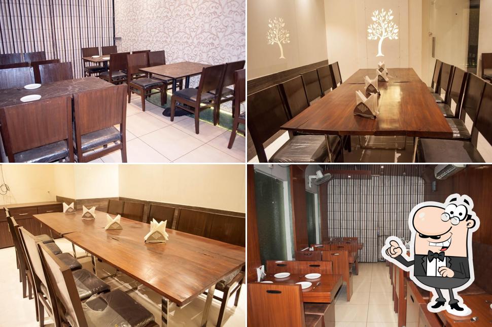 Take a seat at one of the tables at Chawla's Chicken