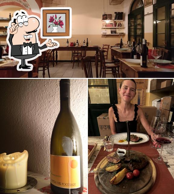 Questa è la immagine che presenta la interni e vino di Assirto