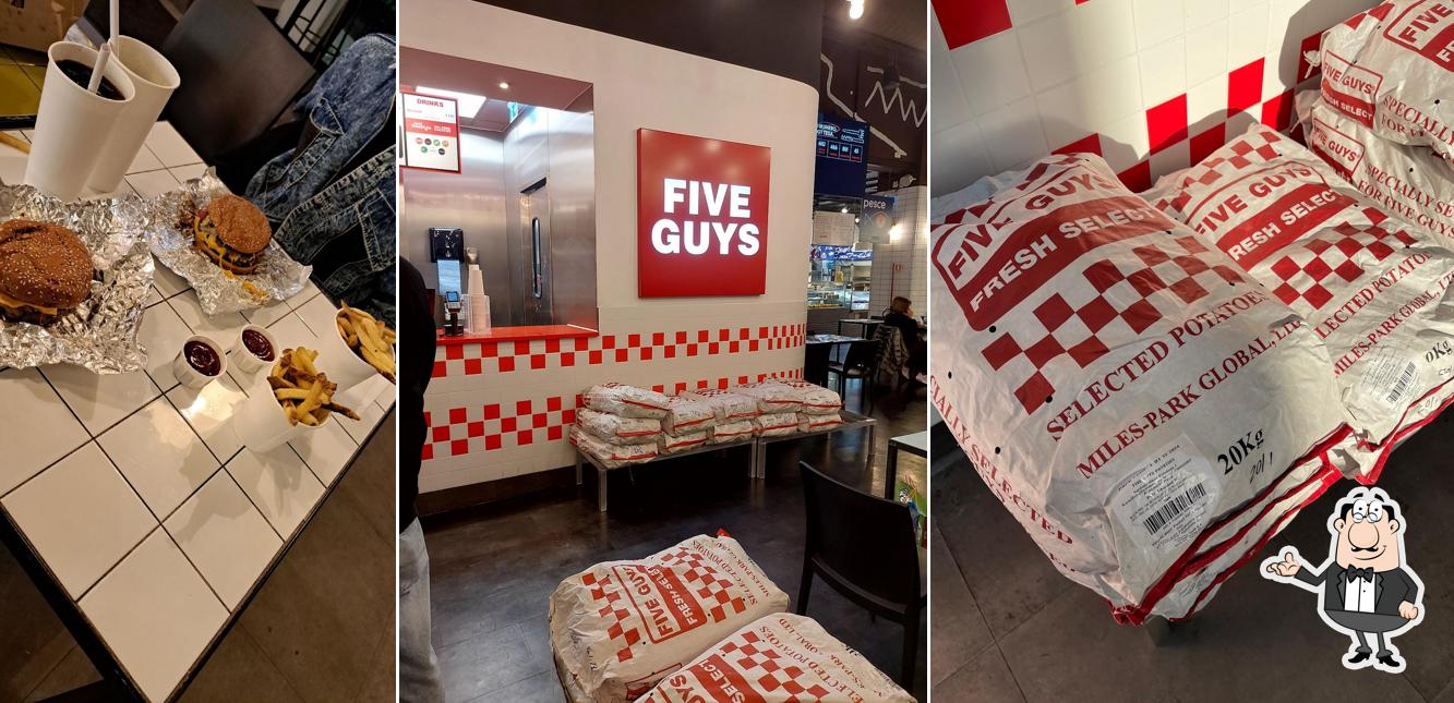 Dai un'occhiata agli interni di Five Guys Campi Bisenzio