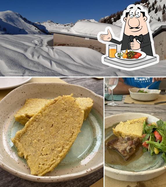 Questa è la immagine che mostra la cibo e interni di Casera Festons