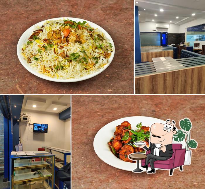 Take a seat at one of the tables at HYDERABAD HOUSE RESTAURANT PUNJAGUTTA