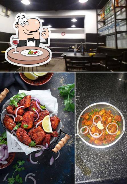 Take a look at the photo depicting food and interior at A 1 Biriyani Hut