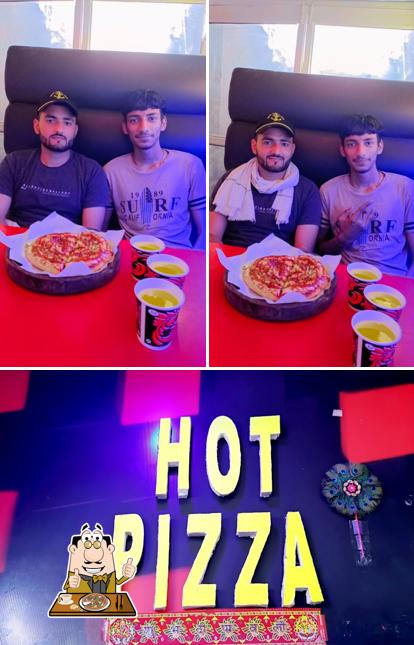 Pick pizza at Hot Pizza Best Pizza Shop In Hisar