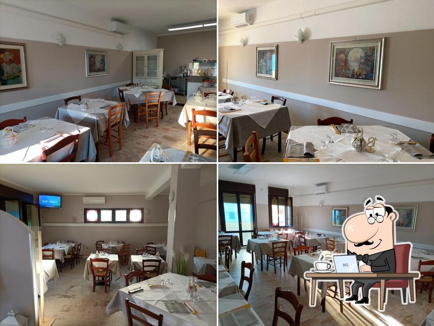 Siediti a un tavolo di Pizzeria ristorante Da Lucio Turolla