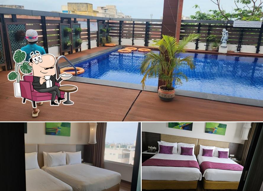 Among different things one can find interior and food at Grand Kakinada by GRT Hotels