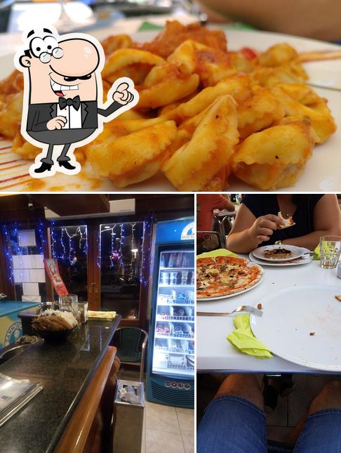 Tra le varie cose da Bar "L'incontro" si possono trovare la interni e cibo