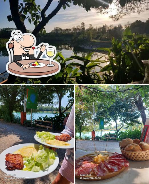 Guarda la foto che mostra la cibo e esterno di Lago Lido