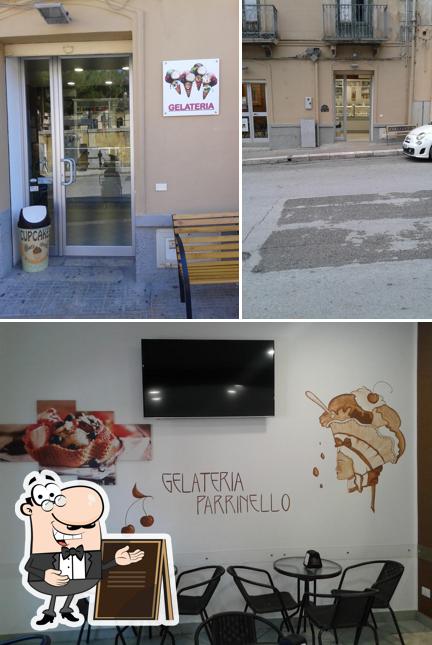 Tra le diverse cose da Gelateria Parrinello si possono trovare la esterno e tavolo da pranzo