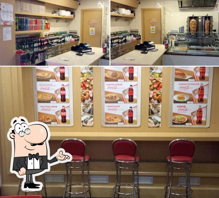 Dai un'occhiata agli interni di king kebab e Pizzeria