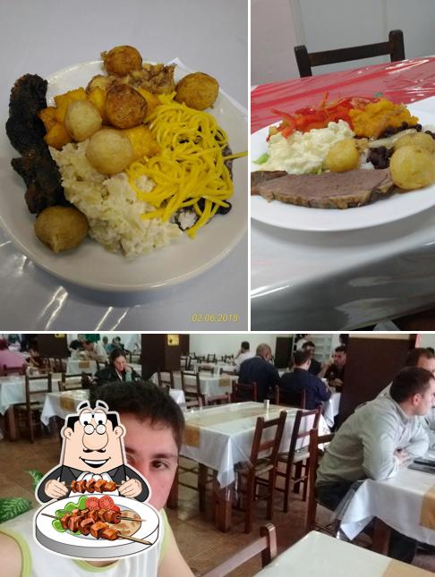 Esta é a imagem mostrando comida e interior no Restaurante Ritter