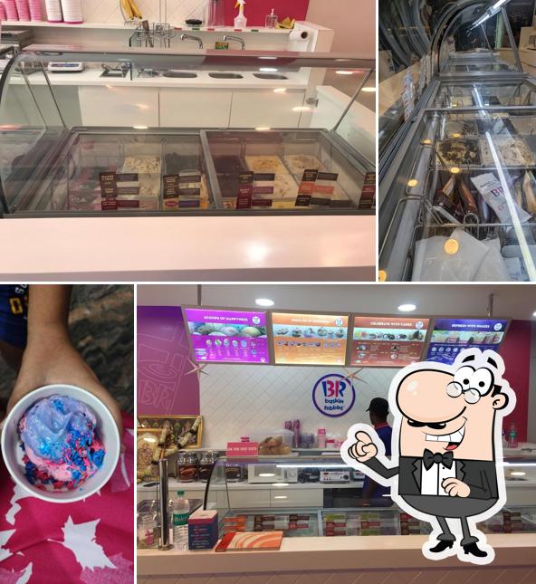 Take a seat at one of the tables at Baskin Robbins