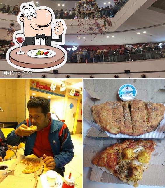 Domino's Pizza Mall of India, Noida is distinguished by food and interior