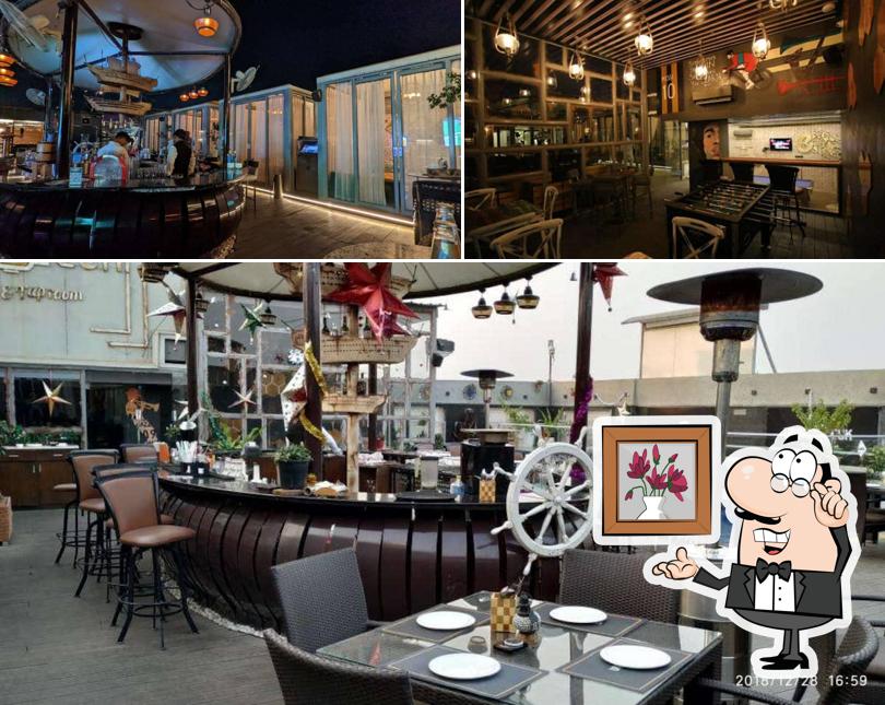 Take a seat at one of the tables at Urban Deck Tapas & Taproom