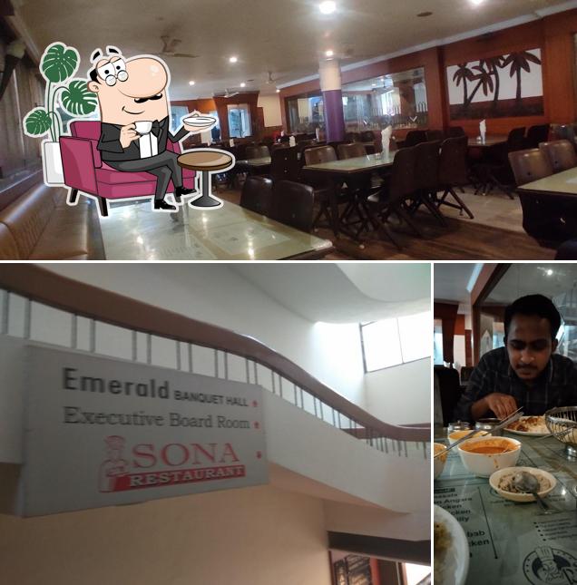 Take a seat at one of the tables at Sona Restaurant