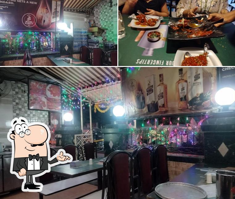 This is the picture showing interior and beverage at Raghuvel Restaurant (Gokhale Road)