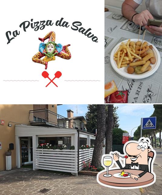 Questa è la foto che presenta la cibo e esterno di La pizza da Salvo