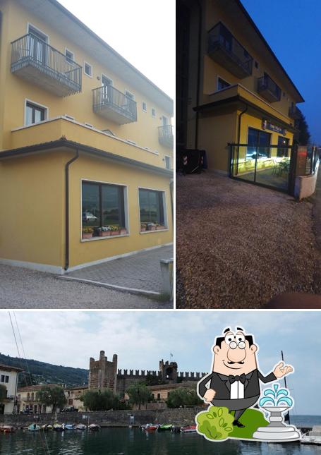 Puoi goderti l'aria fresca da seduto all'esterno di Villa Eva albergo ristorante