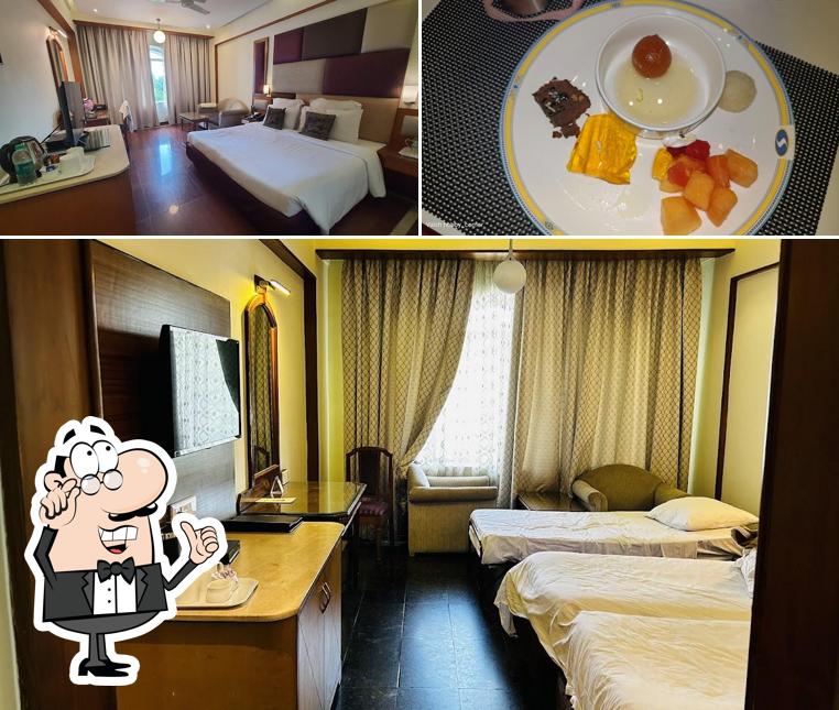 Check out the image displaying interior and food at Hotel Sandesh The Prince
