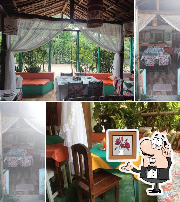 Sente em uma das mesas no Restaurante da D'Ajuda