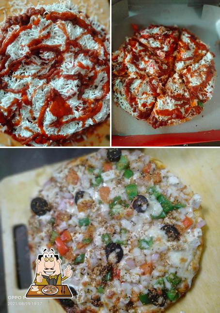 Order pizza at Dinesh Cafe
