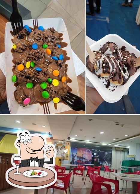 Take a look at the photo displaying food and interior at 99 Pancakes