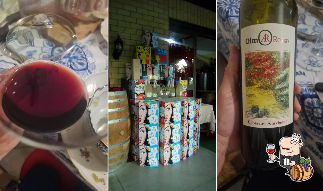 Goditi un bicchiere di vino a Enoteca LE VIGNE AR