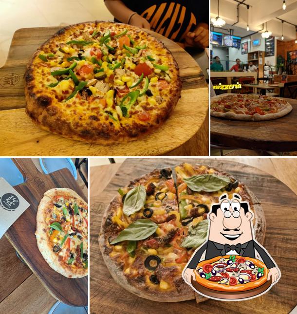 At 1441 Pizzeria Surat, you can enjoy pizza