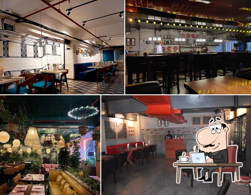 Take a seat at one of the tables at The Other Side