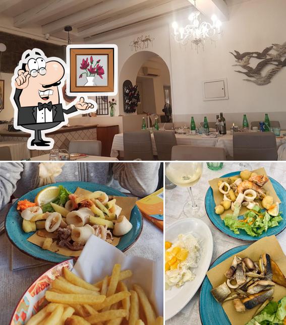 Dai un’occhiata alla immagine che presenta la interni e bevanda di Il Cantuccio