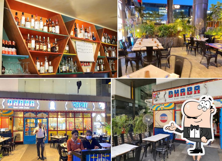 Take a seat at one of the tables at Dhaba Estd. 1986, Aerocity Take a seat at one of the tables at Dhaba Estd. 1986, Aerocity