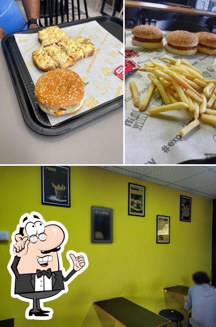 Take a look at the image displaying interior and food at Its Wow