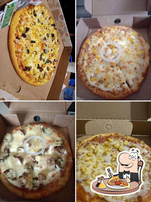 Get pizza at La Milano Pizzeria