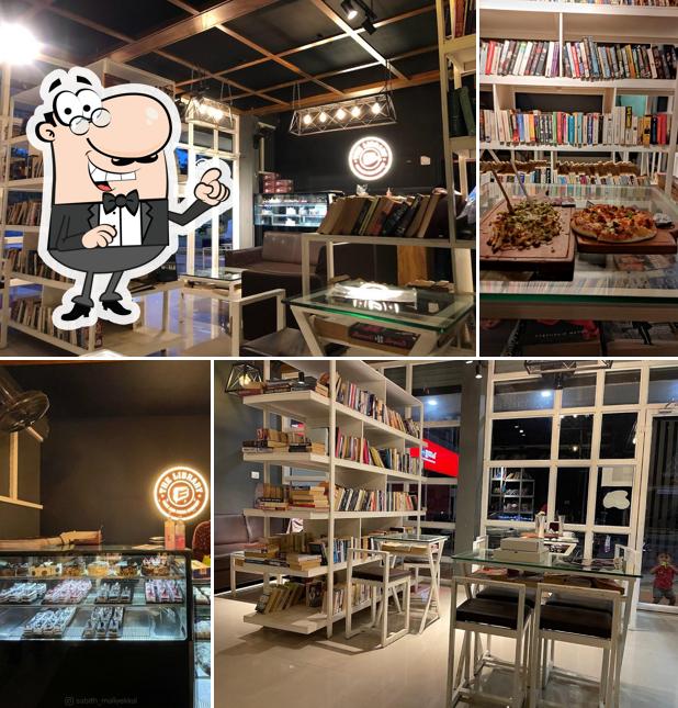 Take a seat at one of the tables at The Library Cake and Pizza Company