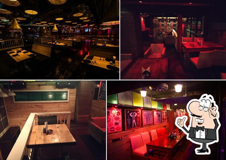 Take a seat at one of the tables at Lighthouse - The Club