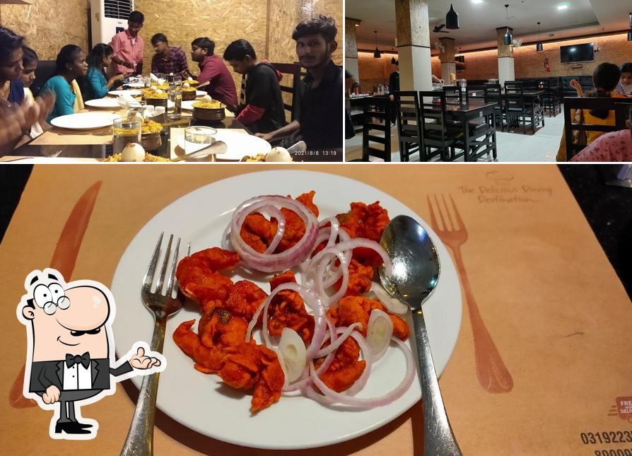 This is the photo displaying interior and food at Deliciaa Restaurant