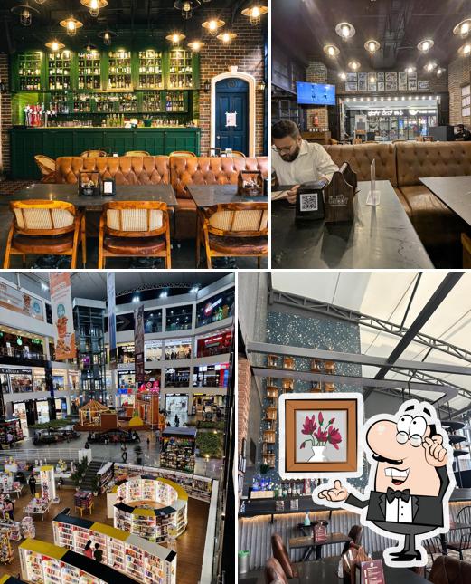 Take a seat at one of the tables at THE GROOT - Fusion Kitchen & Bar