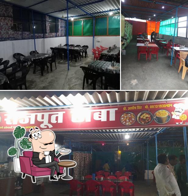 Take a seat at one of the tables at RAJPUT DHABA