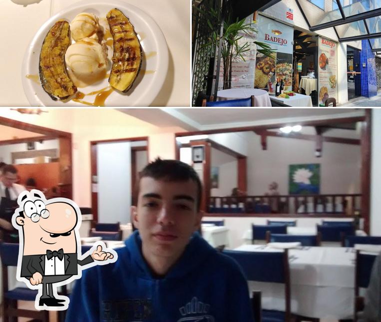Esta é a ilustração apresentando interior e comida no Badejo Dos Mares O Melhor