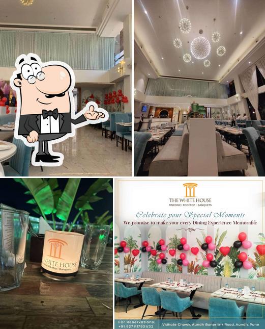 Take a seat at one of the tables at The White House Restaurant, Rooftop & Banquets