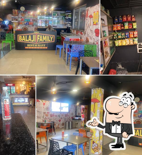 Take a seat at one of the tables at Balaji family restaurant