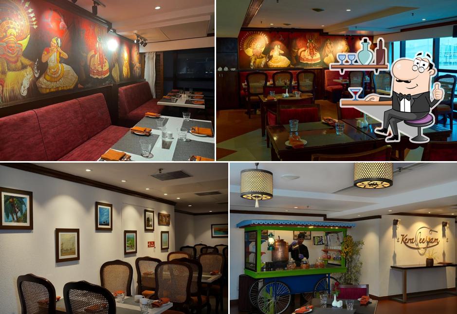 Take a seat at one of the tables at Keraleeyam Restaurant at The Raviz Calicut
