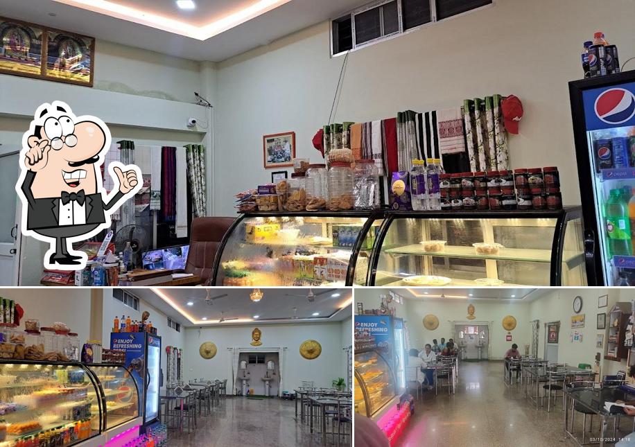 Take a seat at one of the tables at NIMISHA KITCHEN