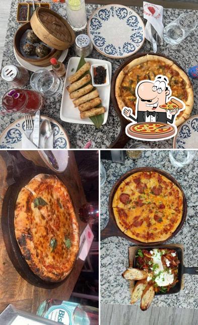 Pick pizza at Roofberries Rooftop