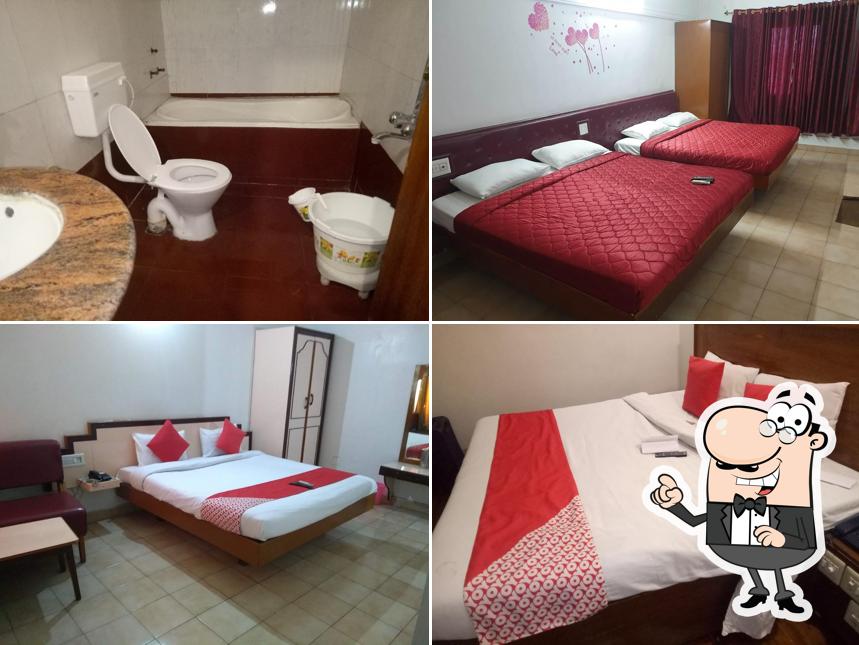 Take a seat at one of the tables at Brindhavan Hotel