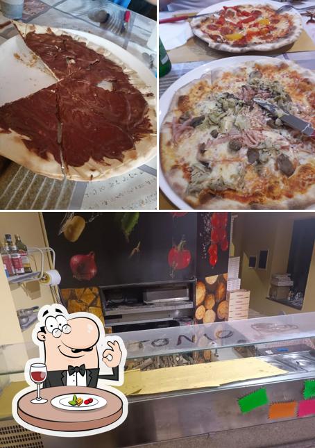 La foto di cibo e interni da Pizzeria Da Romano