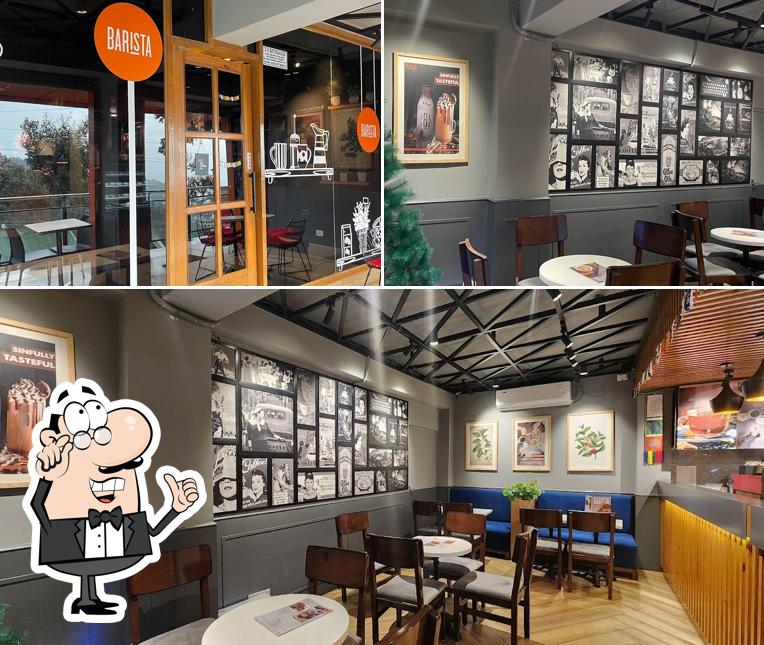 Take a seat at one of the tables at BARISTA