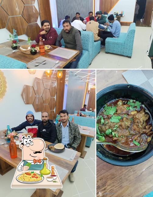 Check out the image depicting food and interior at Purvi Champaran Meat House