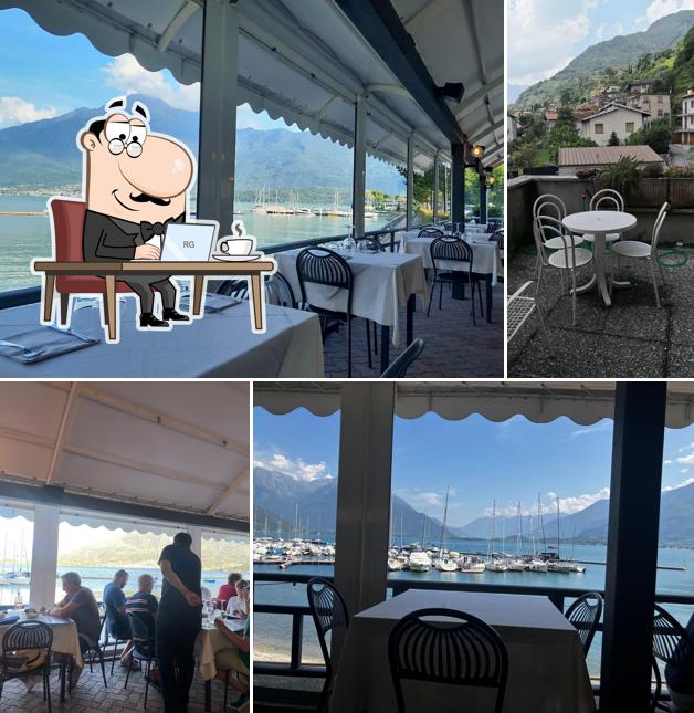Siediti a un tavolo di Ristorante dei Pescatori locanda con alloggio