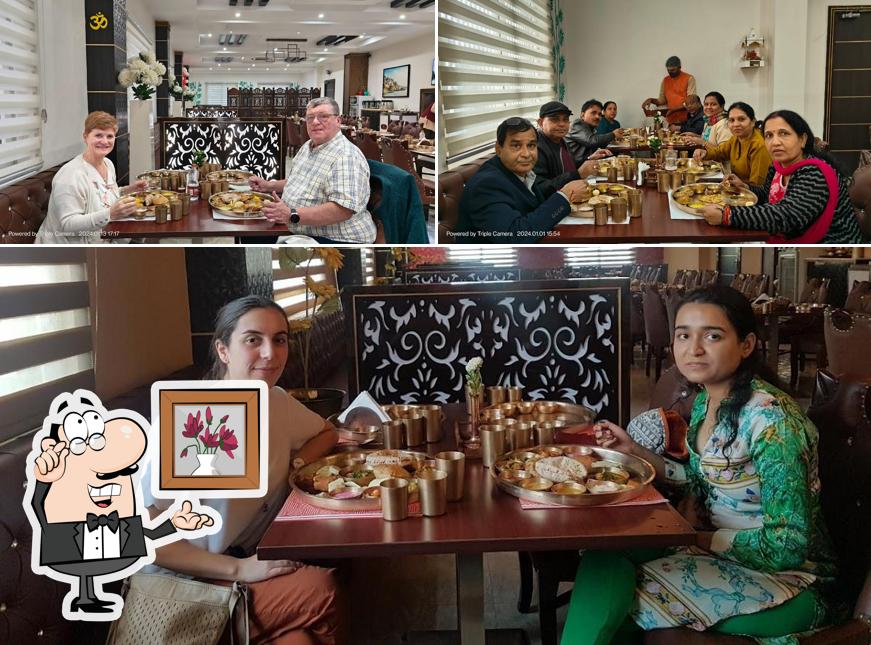 Take a seat at one of the tables at Shree Shivay Thali Dining Varanasi